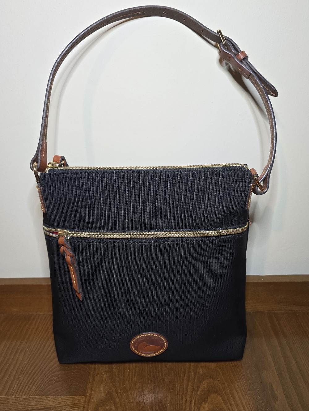 Dooney & Bourke Black Canvas Messenger with Brown Leather Trim